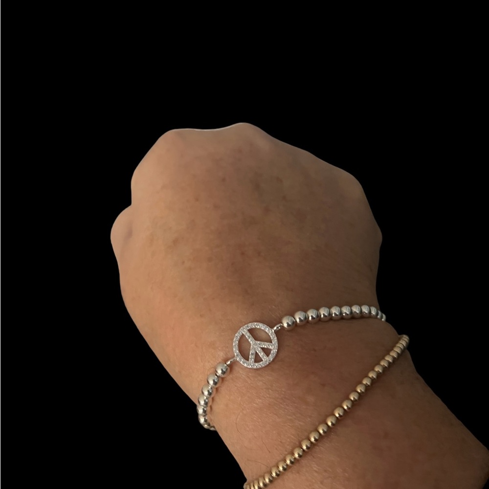 Sterling silver w diamond chips peace